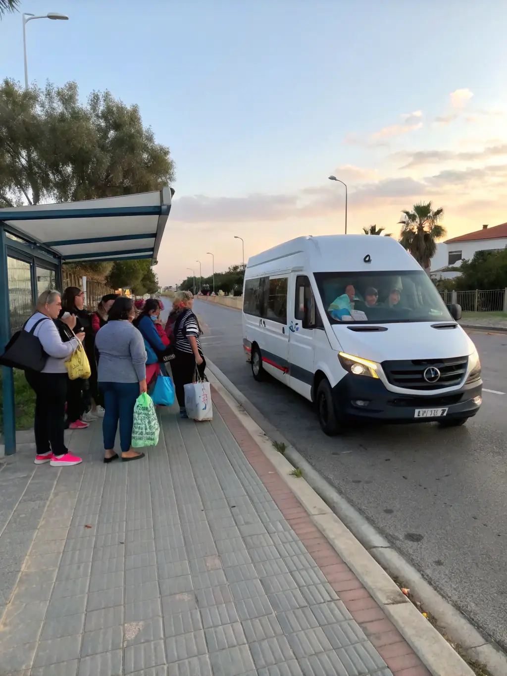 A well-maintained van arriving promptly at a designated pickup location, showcasing Kaplent OÜ's commitment to punctuality.